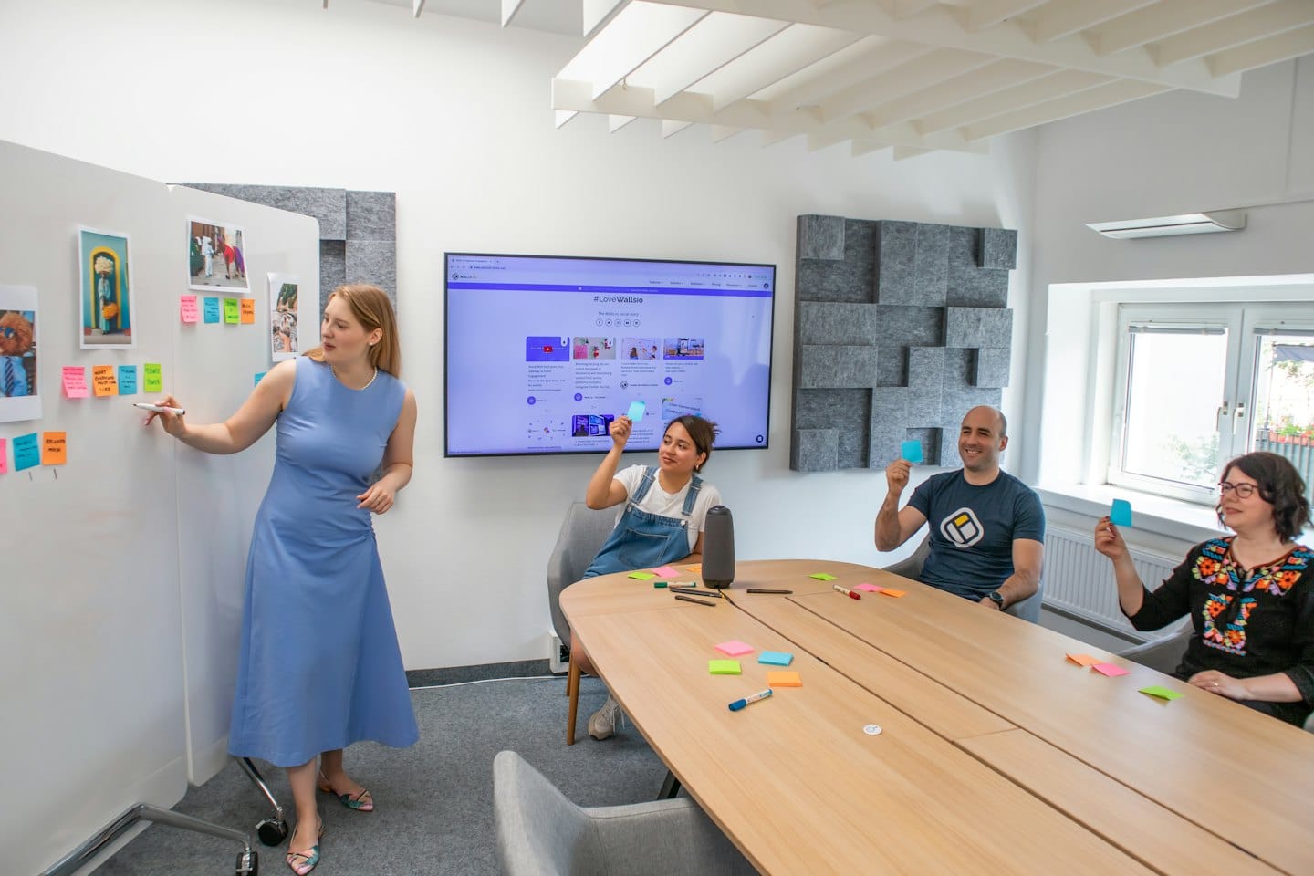 Services Diverse professionals brainstorming ideas in a modern meeting room.